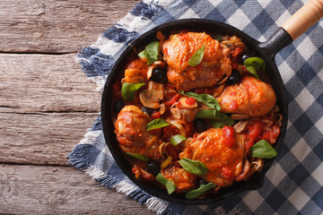 Wall Mural - Cacciatori Chicken with mushrooms in a pan. horizontal top view
