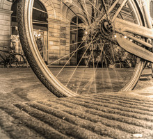 Colorful Bicycle On The Edge Of The Road In Sepia Tone