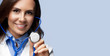 doctor with stethoscope in hand, with copyspace
