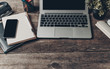 © fotofabrika - Notebook and laptop on old wooden desk