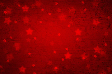 Wall Mural - grunge magical blurry star shape abstract christmas and new year holidays copy space on red backgrou
