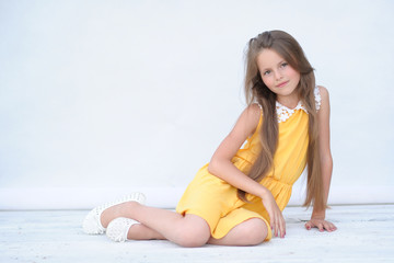 Wall Mural - portrait of little girl outdoors in summer