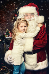 Canvas Print - hugging Santa Claus