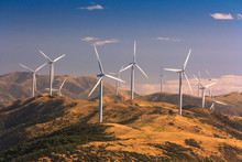 Landscape With Hills And Wind Turbines
