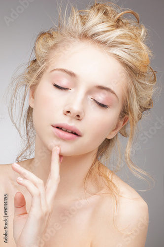 Beauty Portrait Closeup Of A Young Beautiful Girl With Blonde Hair