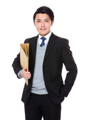 Wall Mural - Young Businessman hold with folder