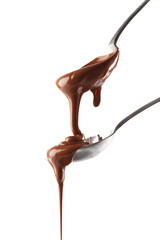 Poster - Melted milk chocolate pouring from spoons, isolated on white