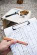 © goodmanphoto - worker holding construction blue prints