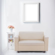 © Odua Images - living room with blank poster or photo frame