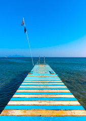 Wall Mural - Beautiful wooden pier at a beach in kefalos area in Kos island in Greece