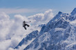 © Vasily Merkushev - Flying snowboarder on mountains