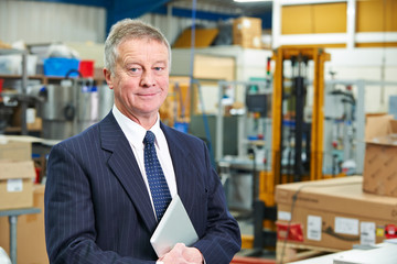 Portrait Of Factory Owner With Digital Tablet