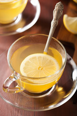 Canvas Print - hot lemon ginger tea in glass cup