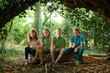 © highwaystarz - Group Of Children Eating Sausages In Woodland Camp