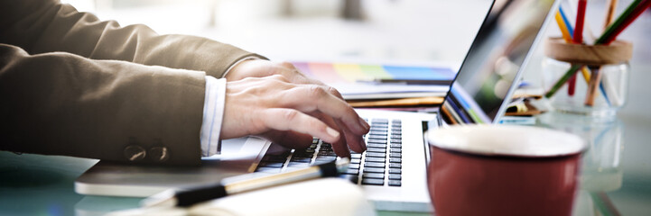 Wall Mural - businessman working typing using notebook concept