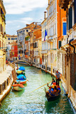 Fototapeta Uliczki - Tourists traveling in gondola, Rio Marin Canal, Venice, Italy