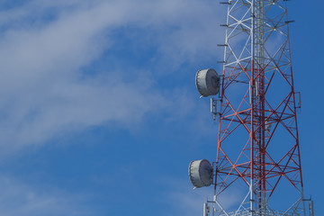 Telecommunication tower and antenna against the sky