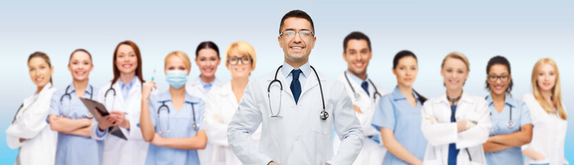 Sticker - group of smiling doctors with clipboard over gray