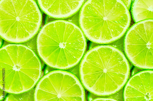 Naklejka - mata magnetyczna na lodówkę Lime slices background