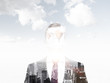 A transparent silhouette of a businessman. New York city view inside the silhouette. Cloudy sky on the background.