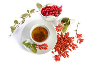 Wall Mural - presentation for goji fresh antioxidant tea isolated on white 