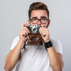 Wall Mural - Photographer with retro camera