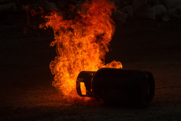 Powerful gas explosion with fire flame on black background