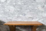 Fototapeta Desenie - Empty top wooden shelves and stone wall background
