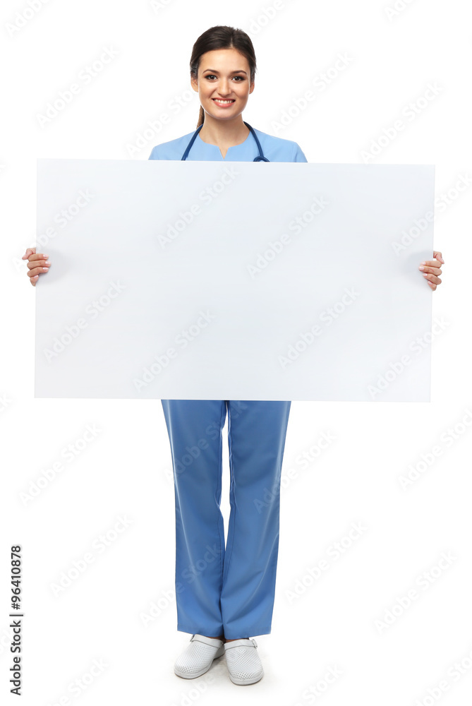Smiling medical doctor holding a screen isolated on white
