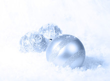 Icy Blue White Christmas Background. Selective Focus On Glitter Band Of Large Ornament.