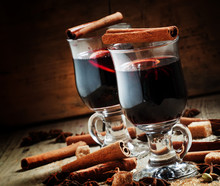 Hot Mulled Wine With Spices On An Old Wooden Background, Selecti