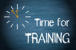 © DOC RABE Media - Time for Training - clock with text on blue background