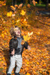 © FotoCuisinette - Fun with autumn leaves.