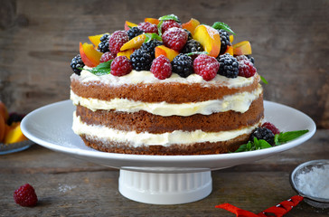 Wall Mural - Naked cake with cream, decorated with raspberries, blackberries, peaches 