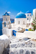 © Martin M303 - Scenic view of traditional cycladic white houses and blue domes