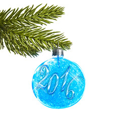 Wall Mural - 2016 on a blue christmas ball hanging from a branch isolated on white