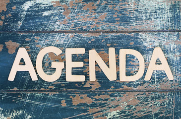 Wall Mural - Word agenda written with wooden letters on rustic surface
