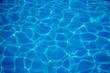 © timonko - Blue texture of water in the pool