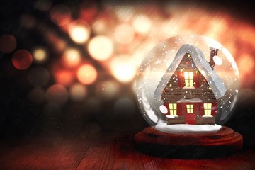christmas house in snow globe