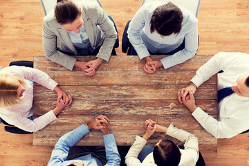 Poster - close up of business team sitting at table