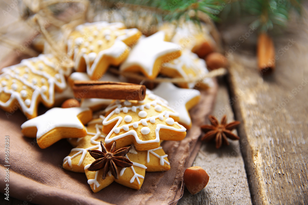 Cookies with spices and Christmas decor, on wooden table