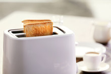 Served Table For Breakfast With Toast And Coffee, On Blurred Background, Close-up