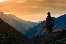 Backpacker Girl Looking At Sunset Colorado Mountains