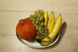 Fototapeta Kuchnia - ваза с фруктами и тыквой