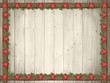 weihnachtlicher Holz Hintergrund mit roten Sternen und Thujenzwe