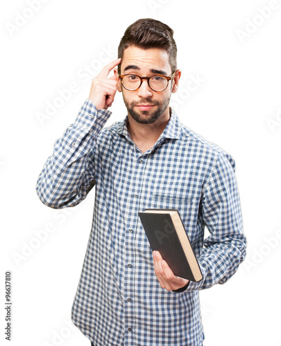man holding a book Stock Photo | Adobe Stock