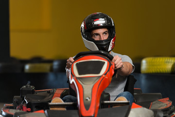 Wall Mural - Young Man Karting Racer