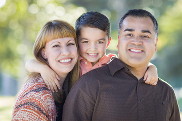 Young Mixed Race Family Portrait Outdoors