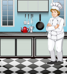 Wall Mural - Male chef in uniform in the kitchen