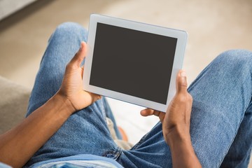 Wall Mural - Close up view of casual man using tablet